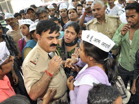 Aam Admi Party activists protest against the rape of a five-year-old in Delhi.